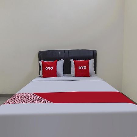 Oyo 91084 Oke Guest House Malang Bagian luar foto