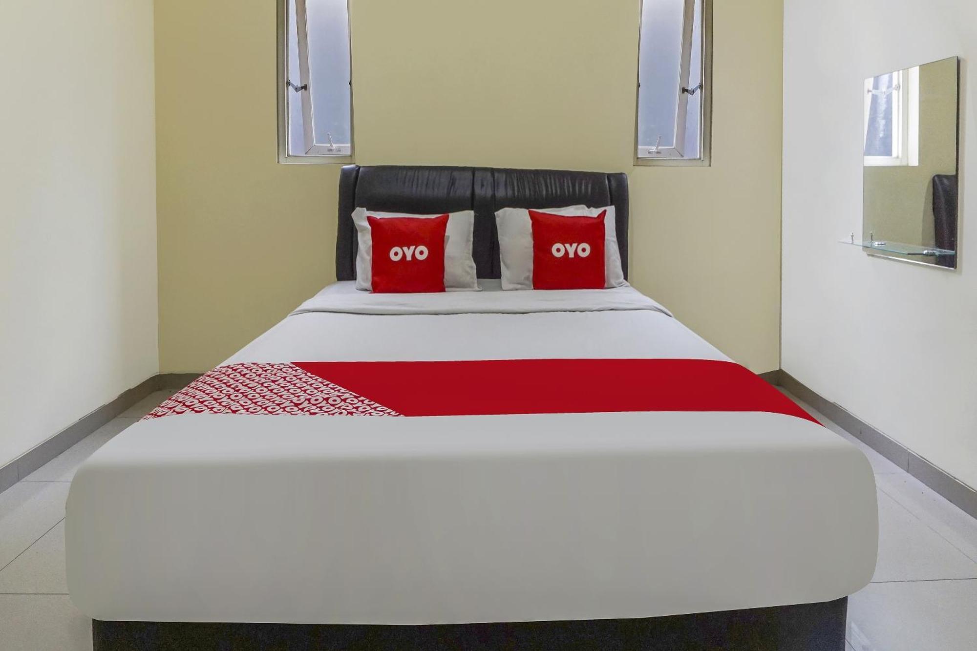 Oyo 91084 Oke Guest House Malang Bagian luar foto
