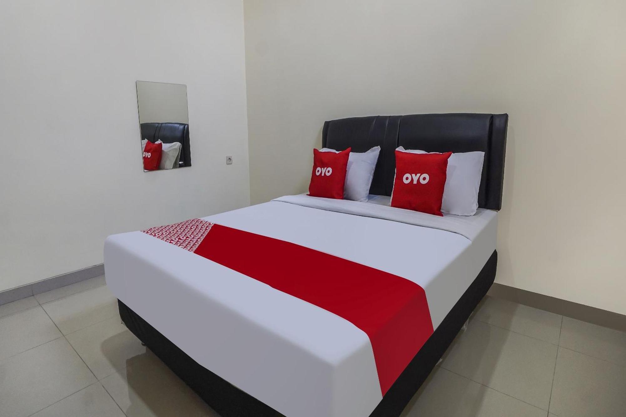 Oyo 91084 Oke Guest House Malang Bagian luar foto
