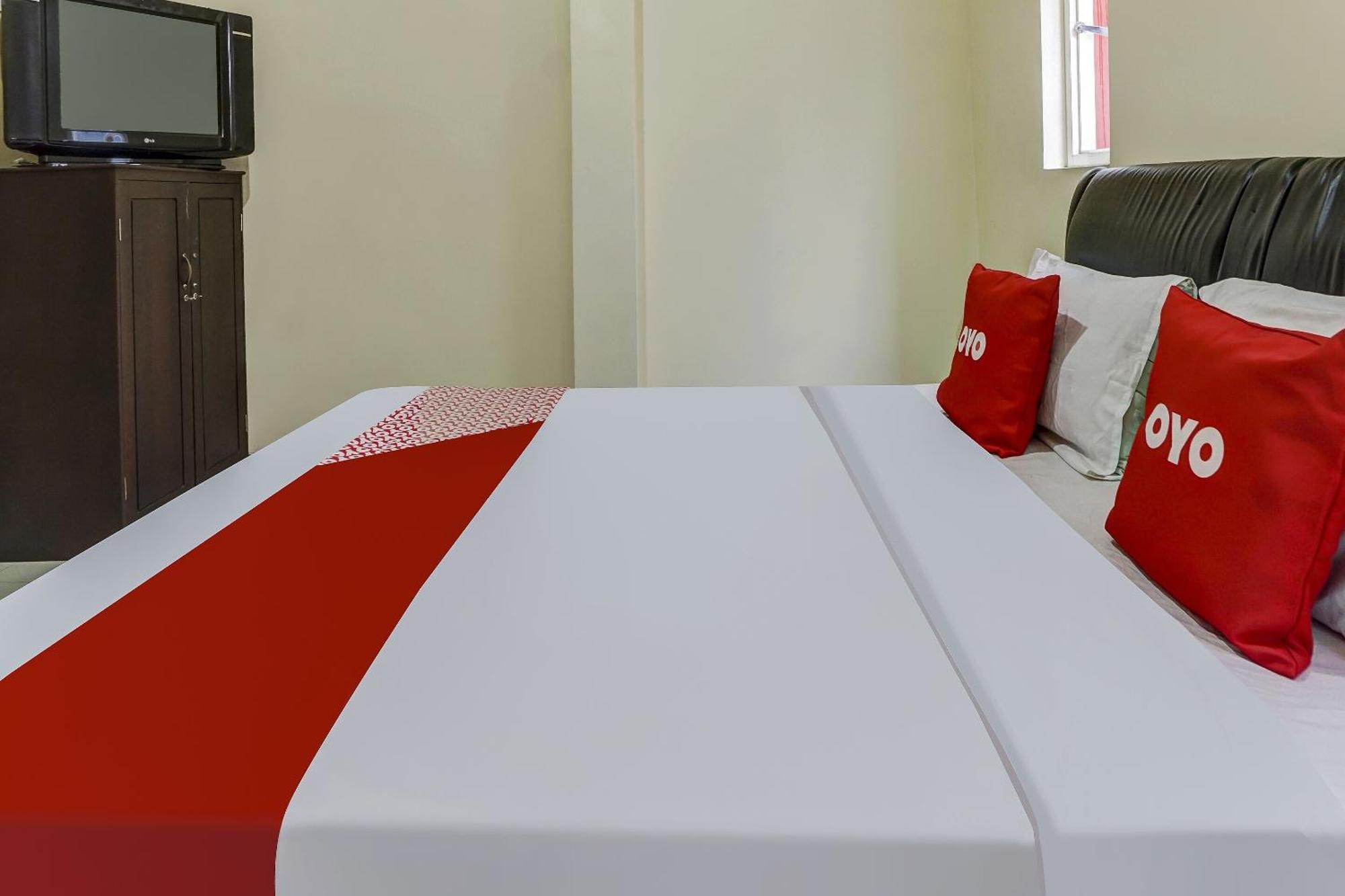 Oyo 91084 Oke Guest House Malang Bagian luar foto