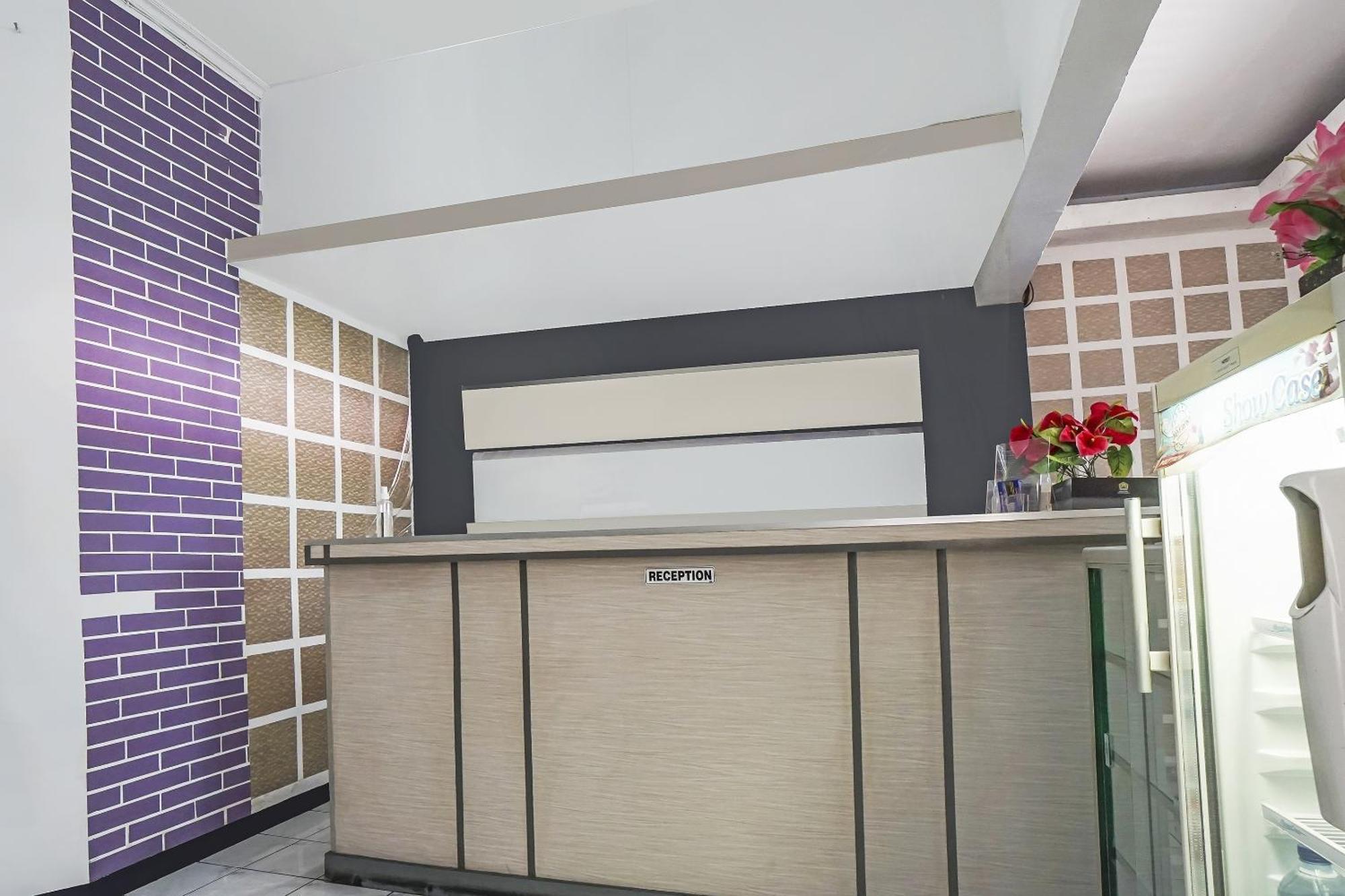 Oyo 91084 Oke Guest House Malang Bagian luar foto